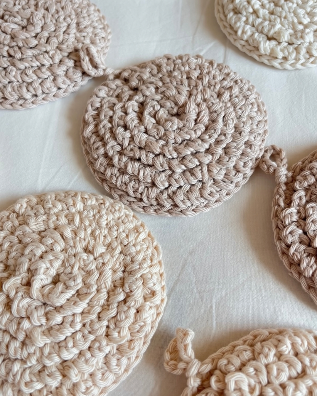 sustainable alternative, natural fiber bath & body sponge handmade in organic cotton, suitable for sensitive skins, plastic free, washable & reusable